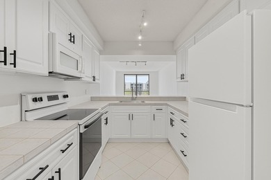 Experience coastal living in this refreshed 2BD/2BA residence in