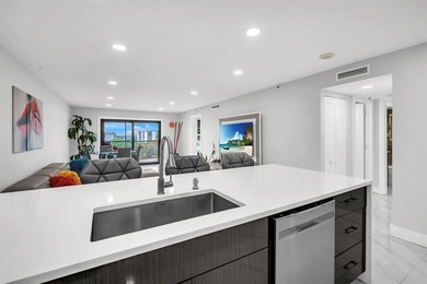 Impeccably renovated corner condo showcasing exceptional luxury