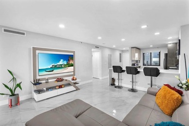 Impeccably renovated corner condo showcasing exceptional luxury