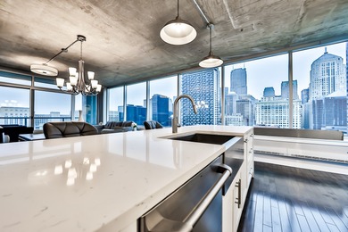 This Modern 3 Bed/2.5 Bath in Printers Row will check all your