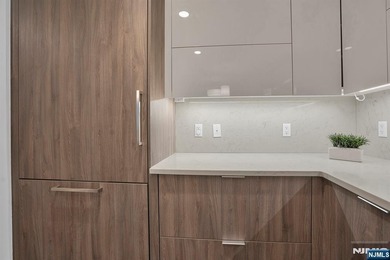 Welcome to an exceptional NE-facing 3BR/2BA residence offering 1