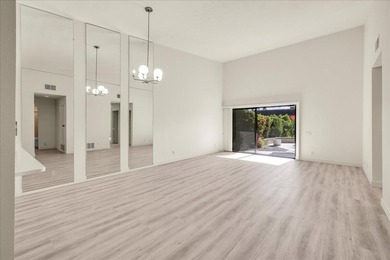 Located in the iconic Rose Garden community in central Palm