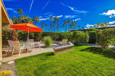 Located in the iconic Rose Garden community in central Palm