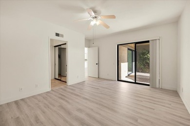 Located in the iconic Rose Garden community in central Palm