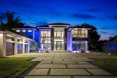 This luxury masterpiece estate, set on nearly one acre, features