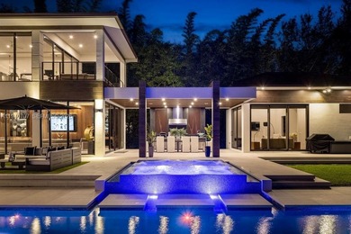 This luxury masterpiece estate, set on nearly one acre, features