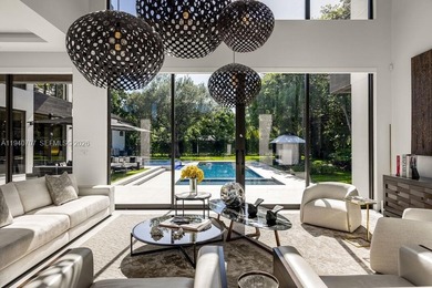 This luxury masterpiece estate, set on nearly one acre, features