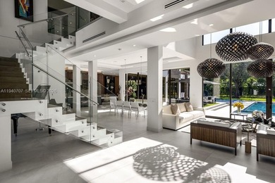 This luxury masterpiece estate, set on nearly one acre, features