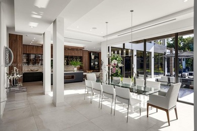 This luxury masterpiece estate, set on nearly one acre, features