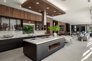 This luxury masterpiece estate, set on nearly one acre, features