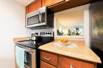 Enjoy the coastal lifestyle in this well-maintained condominium