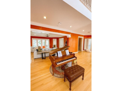 One or more photo(s) has been virtually staged. WORLD-RENOWNED