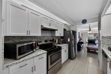 Priced to sell! Bright, updated residence in desirable Century