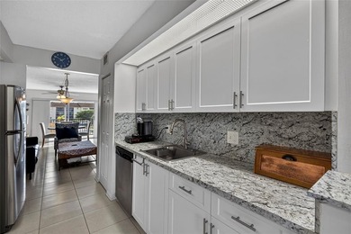 Priced to sell! Bright, updated residence in desirable Century