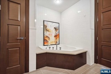 Experience luxury waterfront living in this stunning 2-bedroom