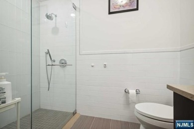 Experience luxury waterfront living in this stunning 2-bedroom