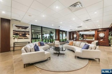 Experience luxury waterfront living in this stunning 2-bedroom