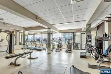 Experience luxury waterfront living in this stunning 2-bedroom