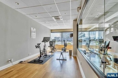 Experience luxury waterfront living in this stunning 2-bedroom