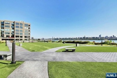 Experience luxury waterfront living in this stunning 2-bedroom