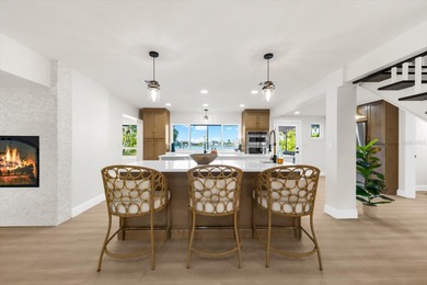 A waterfront escape designed for hosting large gatherings and