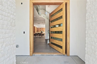 Newly built in 2025, this extraordinary modern residence is