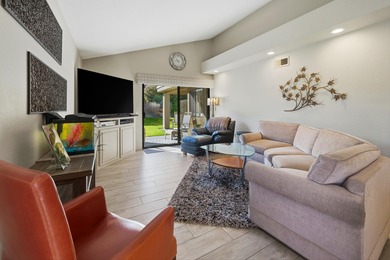 Ideally positioned as an end-unit residence, this beautifully