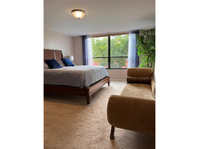 Custom-decorated 2nd-floor unit with neutral colors and two new