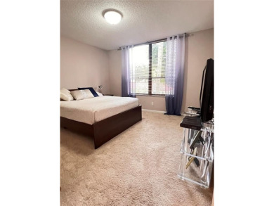 Custom-decorated 2nd-floor unit with neutral colors and two new