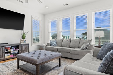 Welcome to your coastal retreat! This bright and inviting 5