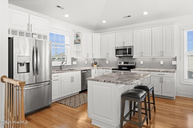 Welcome to your coastal retreat! This bright and inviting 5