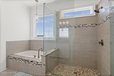 Welcome to your coastal retreat! This bright and inviting 5