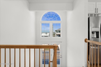 Welcome to your coastal retreat! This bright and inviting 5