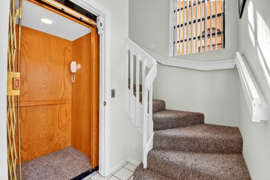 PERFECTION in Platina! Fantastic second floor 3/2 top floor unit