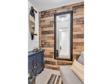 Live the true South Florida lifestyle in this beautifully