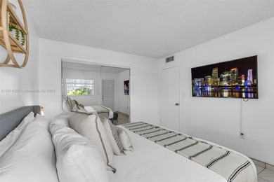 Live the true South Florida lifestyle in this beautifully