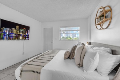 Live the true South Florida lifestyle in this beautifully