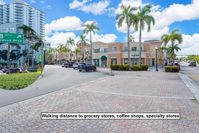 Live the true South Florida lifestyle in this beautifully