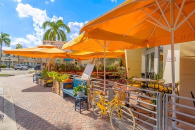 Live the true South Florida lifestyle in this beautifully