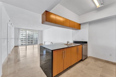 High-floor 1BD/1BA condo at Opera Tower with expansive