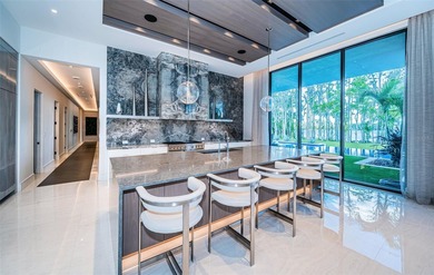 Welcome to a truly one-of-a-kind, ultra-luxurious estate that