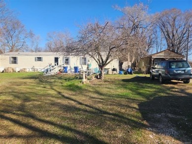 Great location! Just west of Copan Round-up Club. 7.20 acres m/l