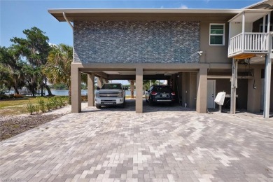 Sweeping Caloosahatchee River views, a private dock with lift