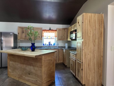 Affordable 3 or 4 bedroom home on Lake Catherine with permitted