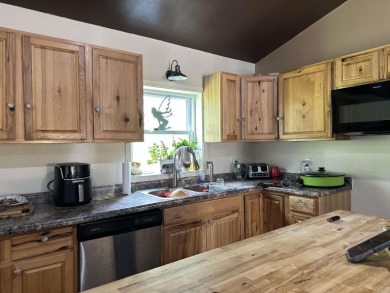 Affordable 3 or 4 bedroom home on Lake Catherine with permitted