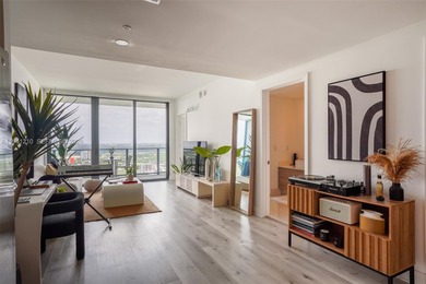 Enjoy stunning city views from this modern 1-bedroom, 1-bath