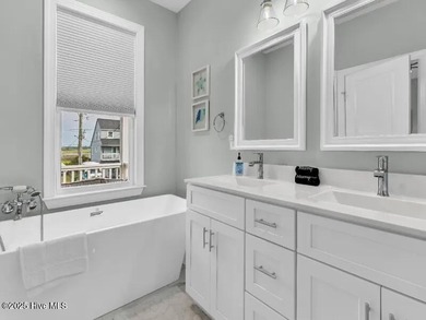 What a view from this Surf City Home with Solid Rental History