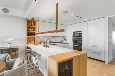 Designer-curated North East Corner residence! This sought-after