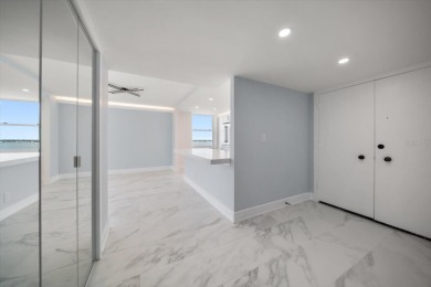 CORNER PENTHOUSE WITH AMAZING  BAY  & GULF VIEWS!!! This new