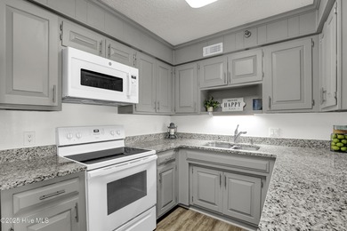 Welcome to your coastal retreat at Shipwatch Villas-where